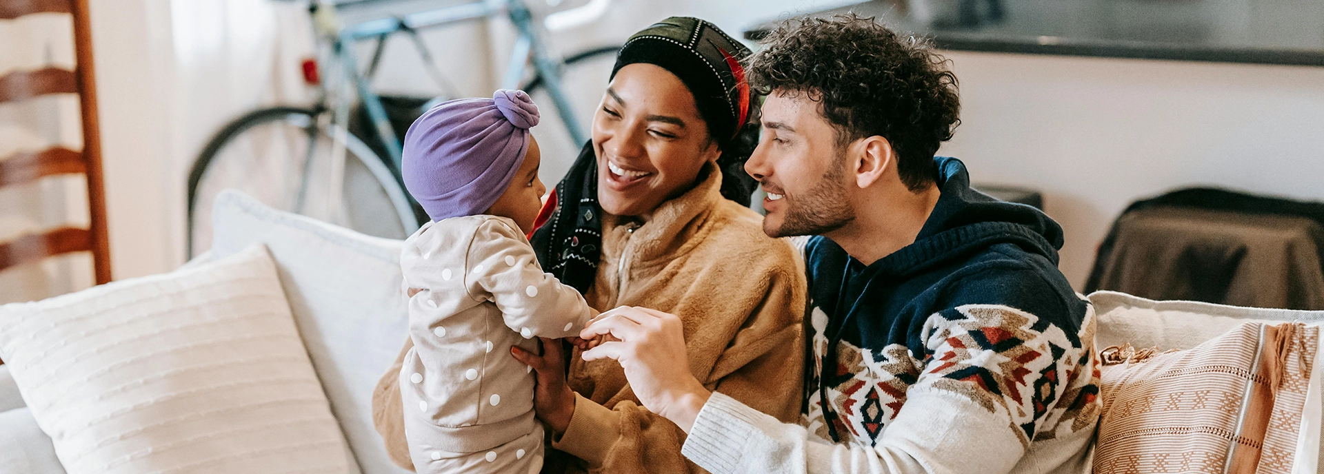 smiling couple with child